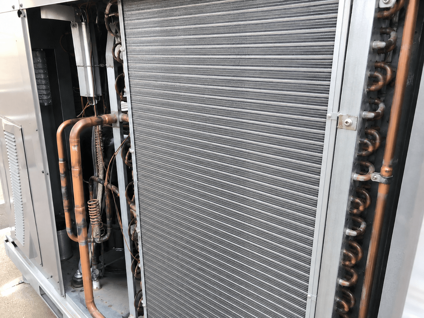 Clean AC coil after professional cleaning with restored coil surface and airflow